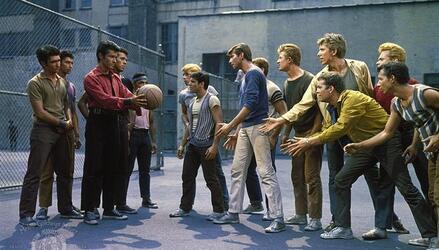 Still from 2021's West Side Story, showing a confrontation between the Jets and Sharks