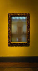 A fogged mirror hanging on a wall