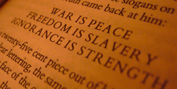 Picture of text from Orwell's 1984, containing Newspeak slogans